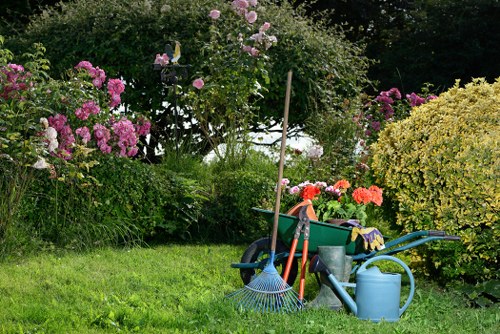 Local gardeners in Southfields trimming and maintaining shrubs