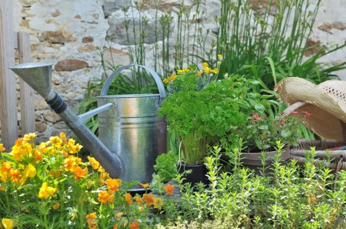 Insured Southfields gardening team completing maintenance with care