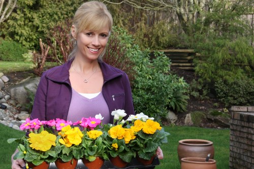 Gardener in Southfields using PPE during professional outdoor work