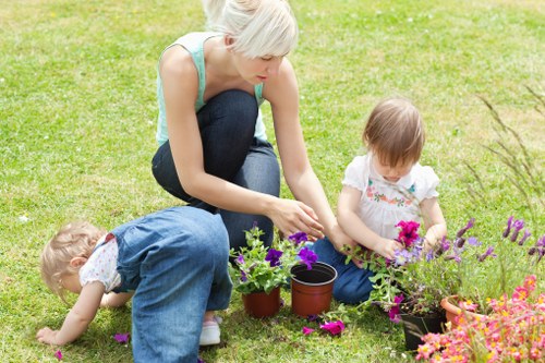 Local gardener trimming hedges and maintaining a Southfields outdoor space